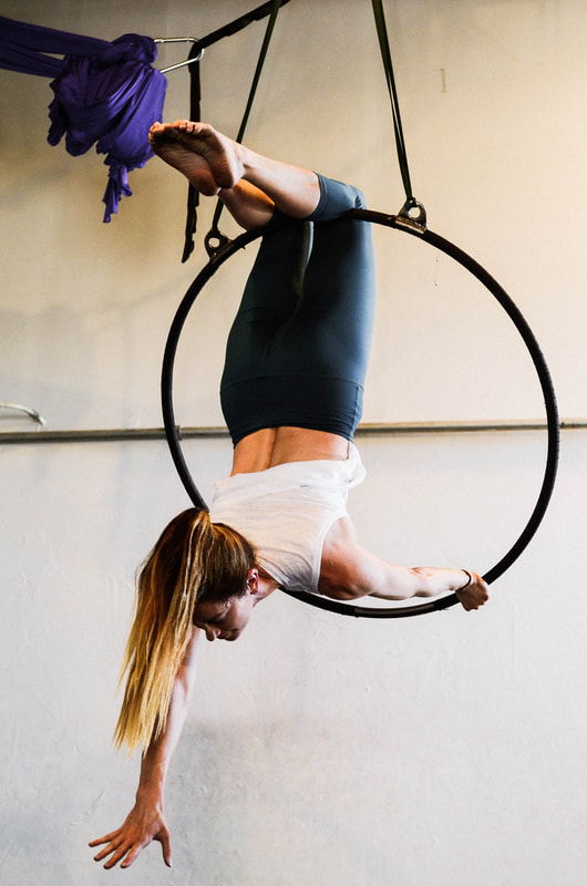 Take Flight Yoga and Movement, Tucson Arizona- aerial hoop class 